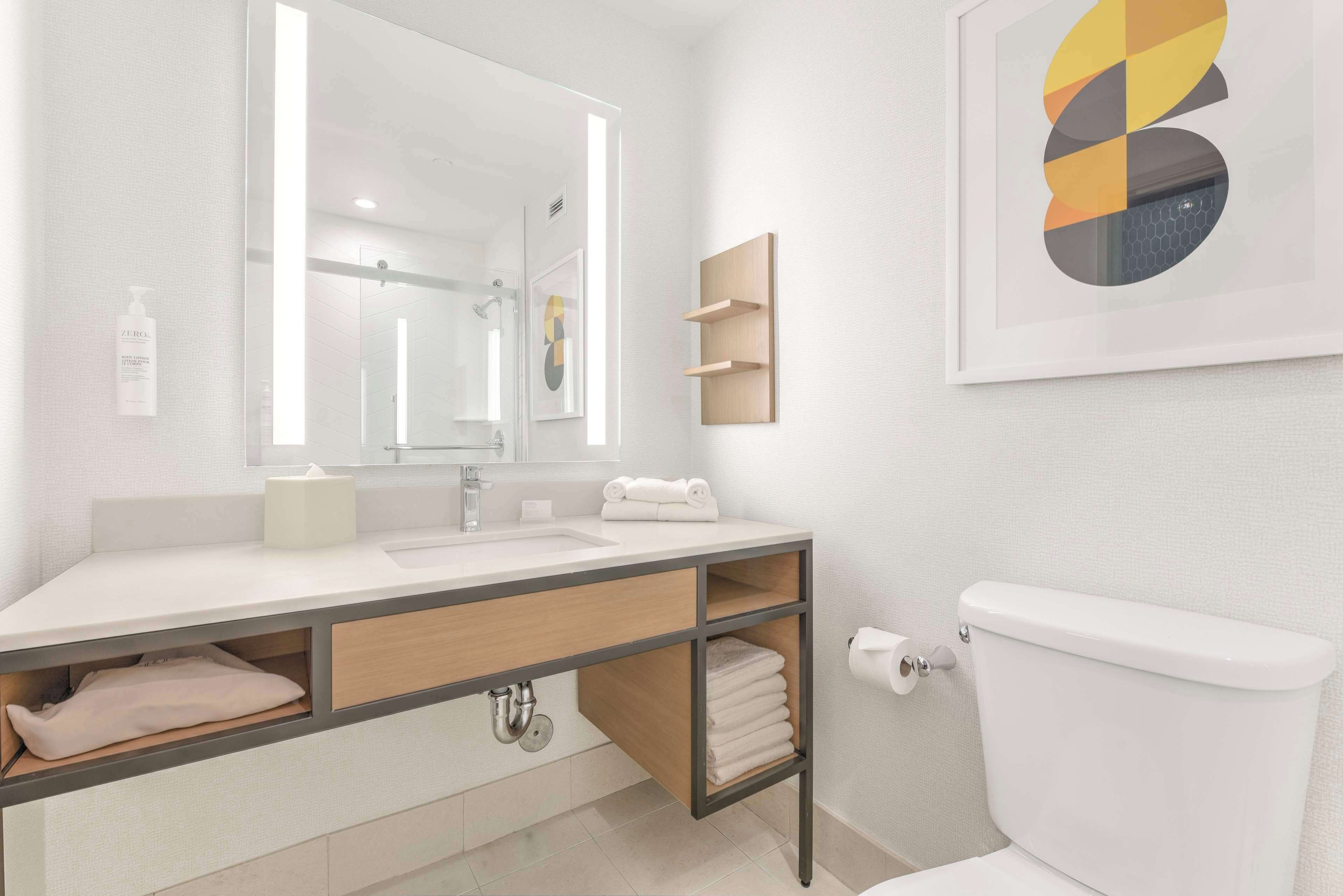 combined shower/bathtub, free toiletries, hair dryer, towels