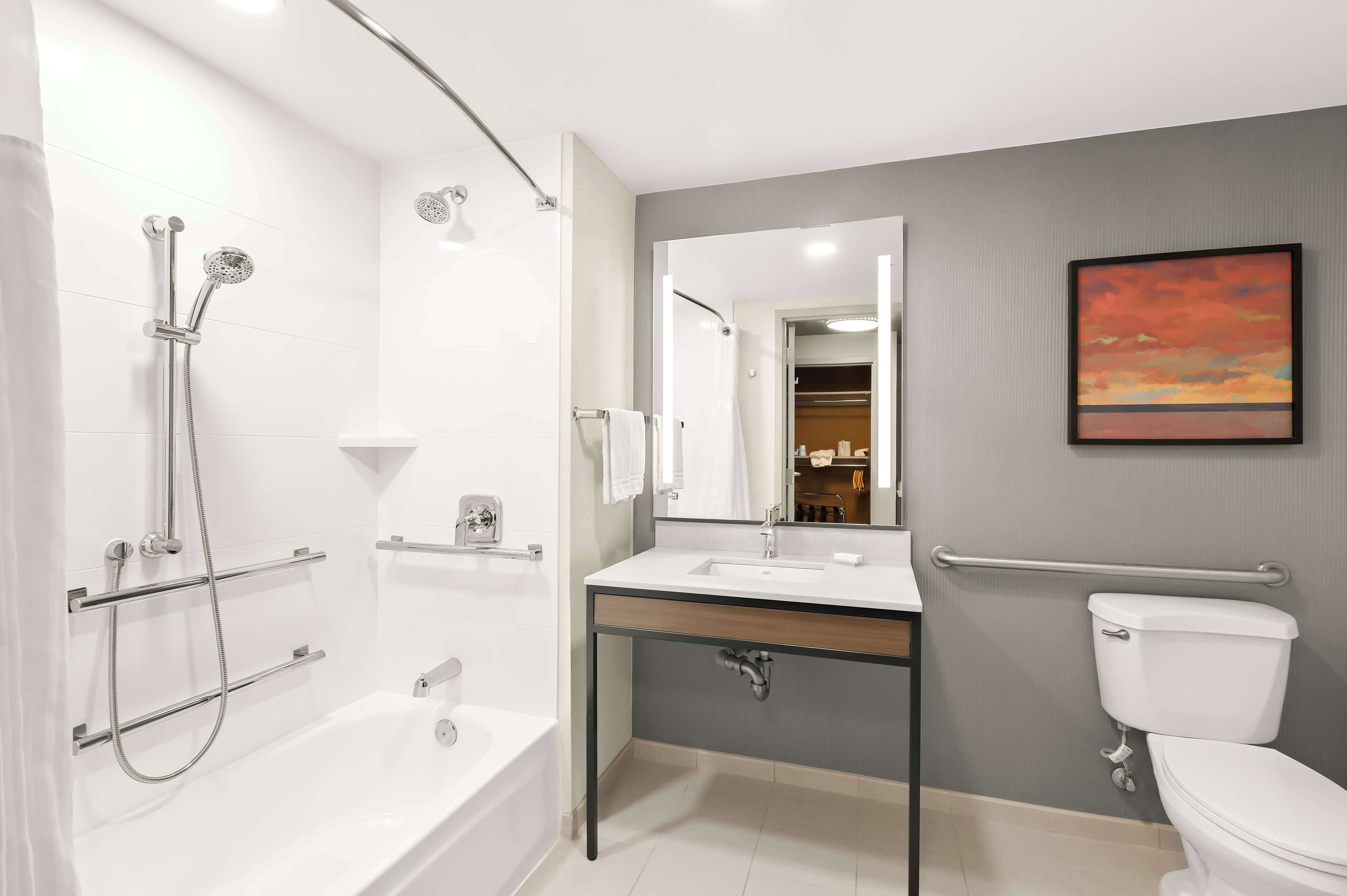 combined shower/bathtub, free toiletries, hair dryer, towels