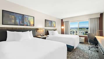 Premium bedding, desk, laptop workspace, iron/ironing board