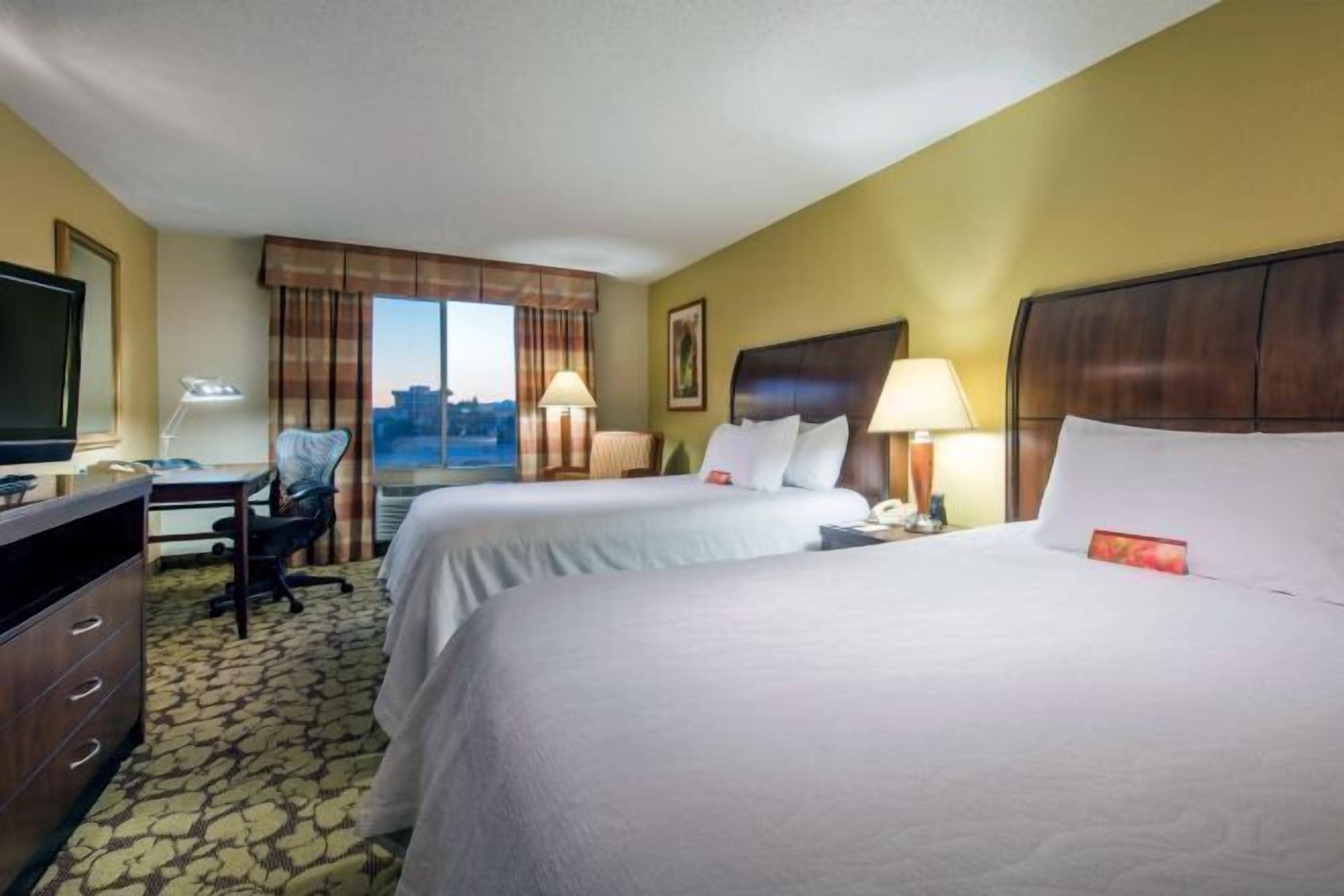 Desk, laptop workspace, blackout drapes, iron/ironing board