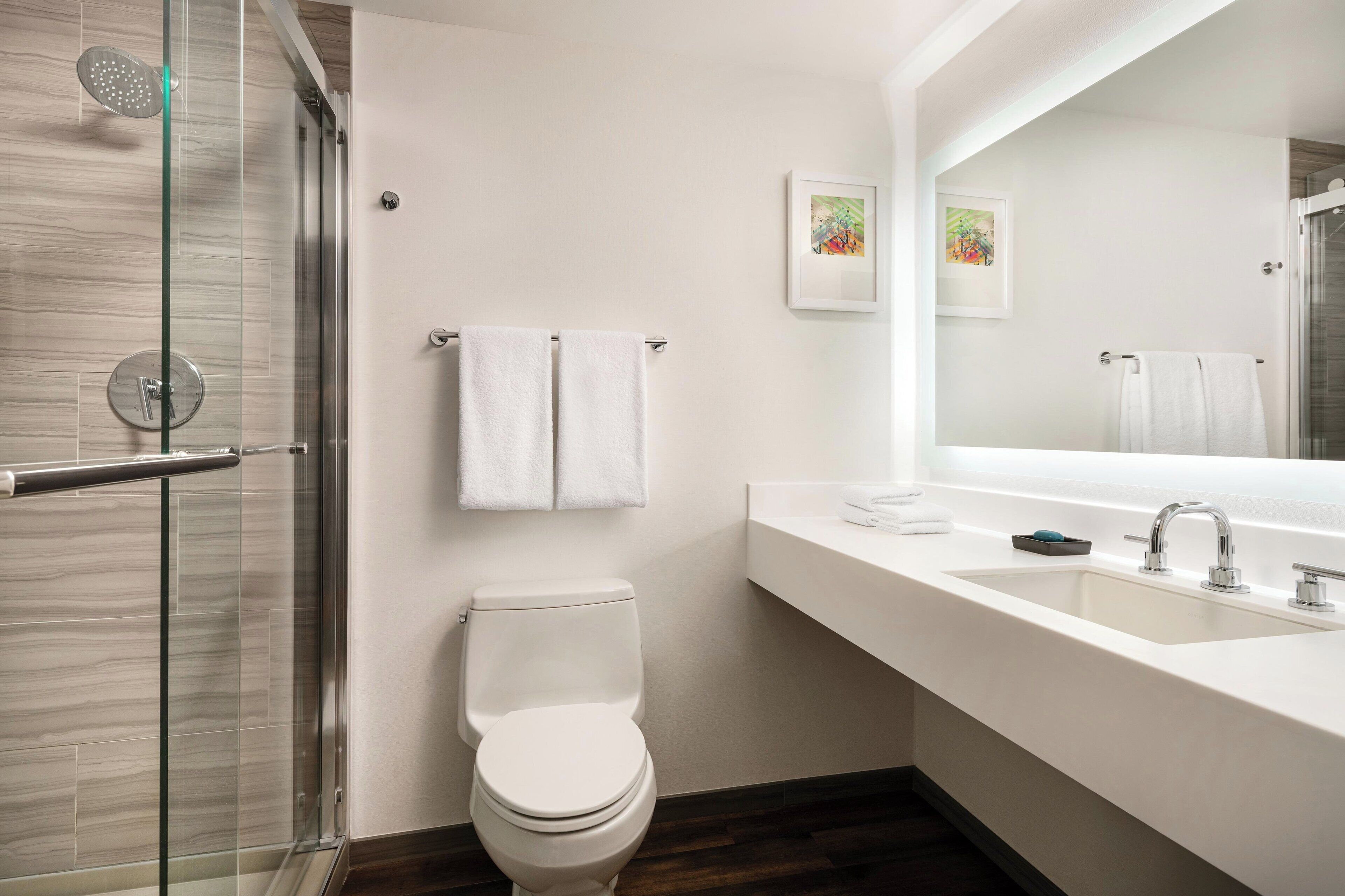 rainfall showerhead, free toiletries, hair dryer, towels