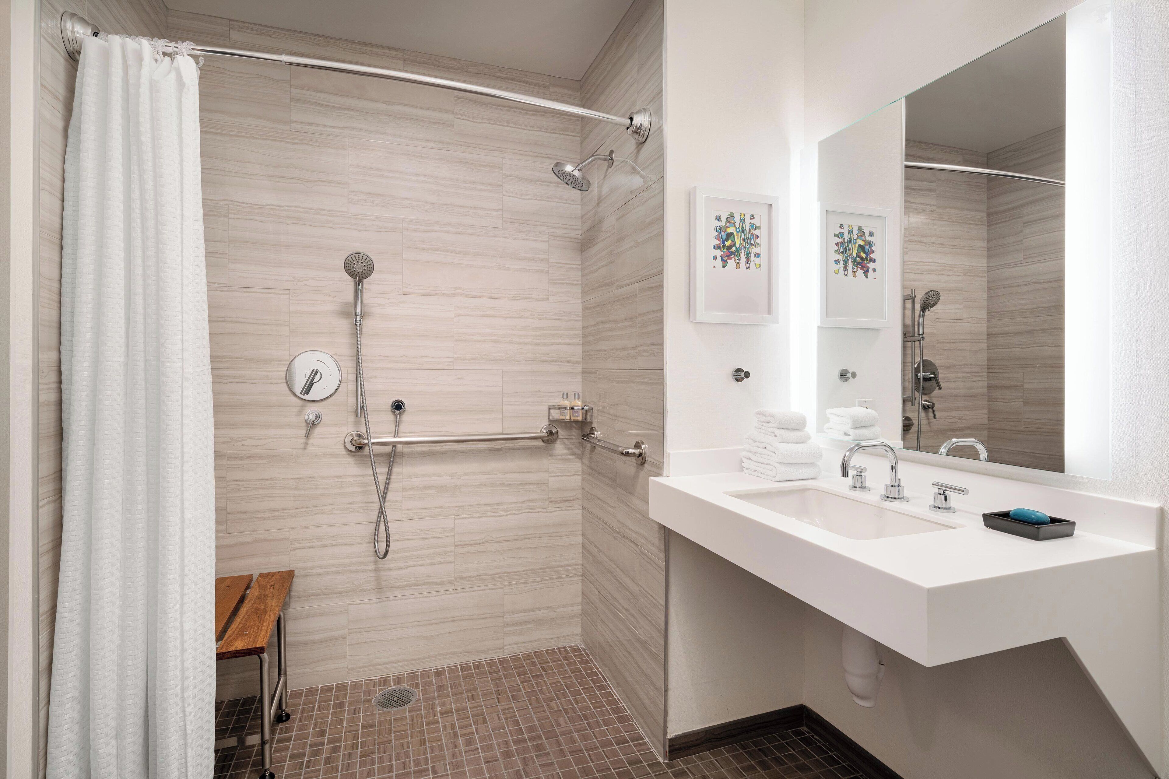 rainfall showerhead, free toiletries, hair dryer, towels