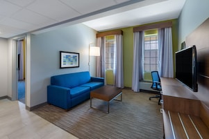 Hypo-allergenic bedding available, down comforters, in-room safe, desk