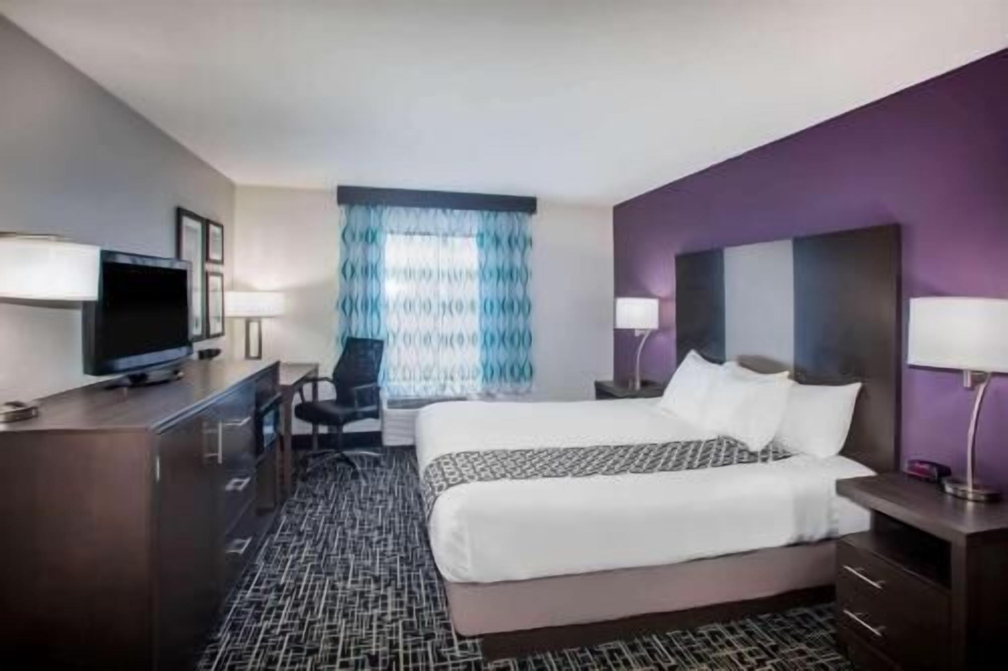 Premium bedding, down comforters, desk, iron/ironing board