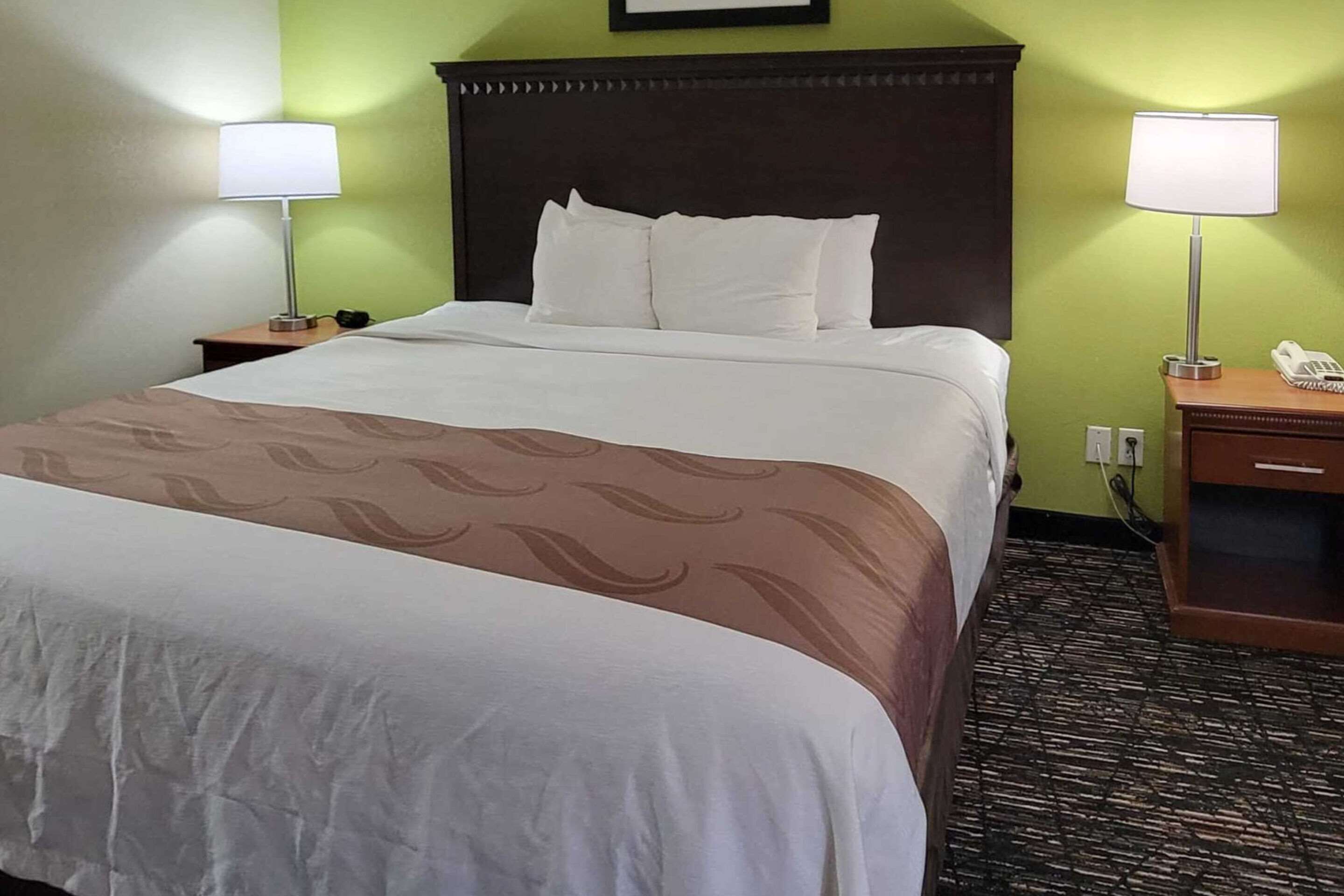 premium bedding, desk, laptop workspace, iron/ironing board