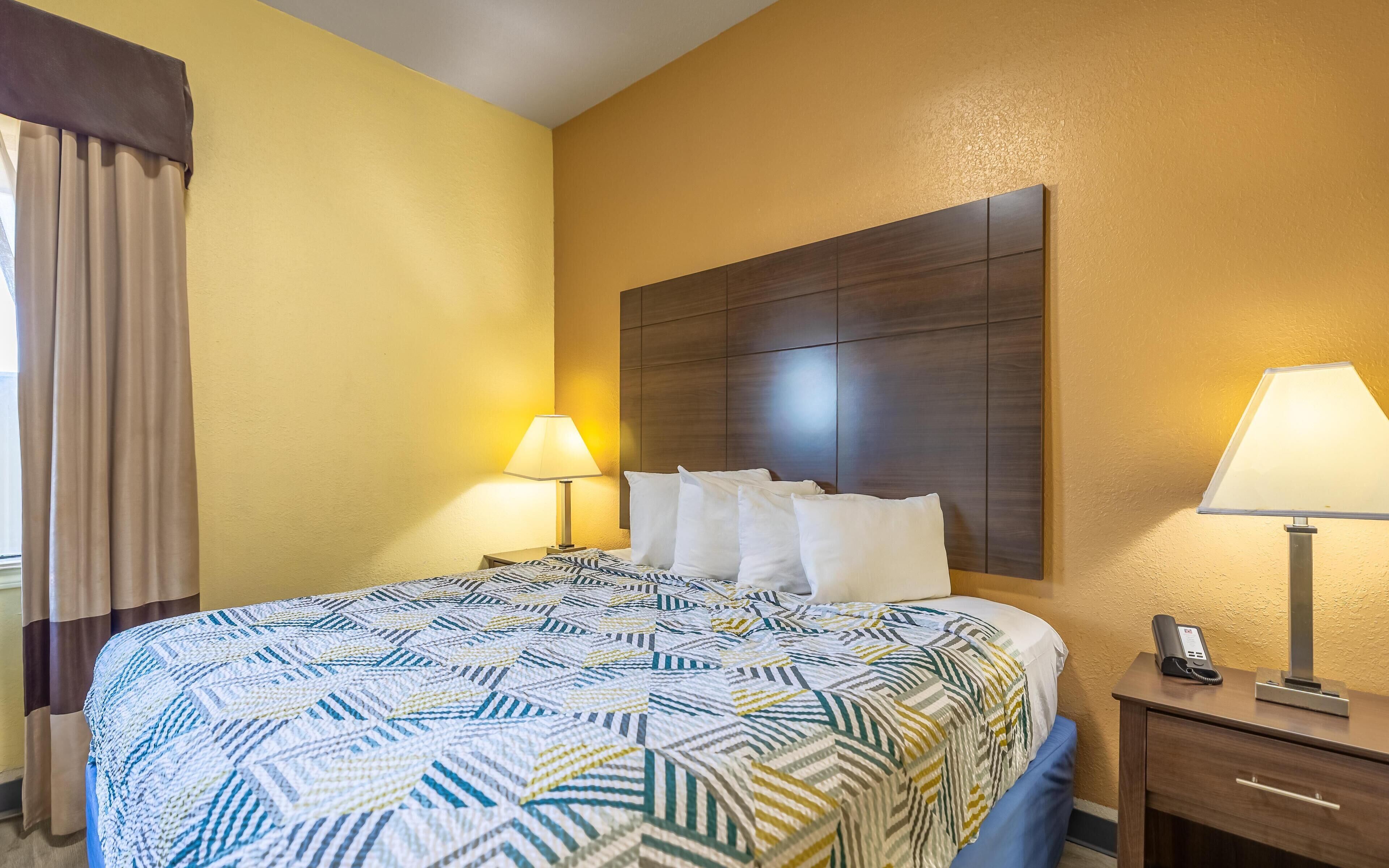 Pillow-top beds, blackout curtains, iron/ironing board, free WiFi