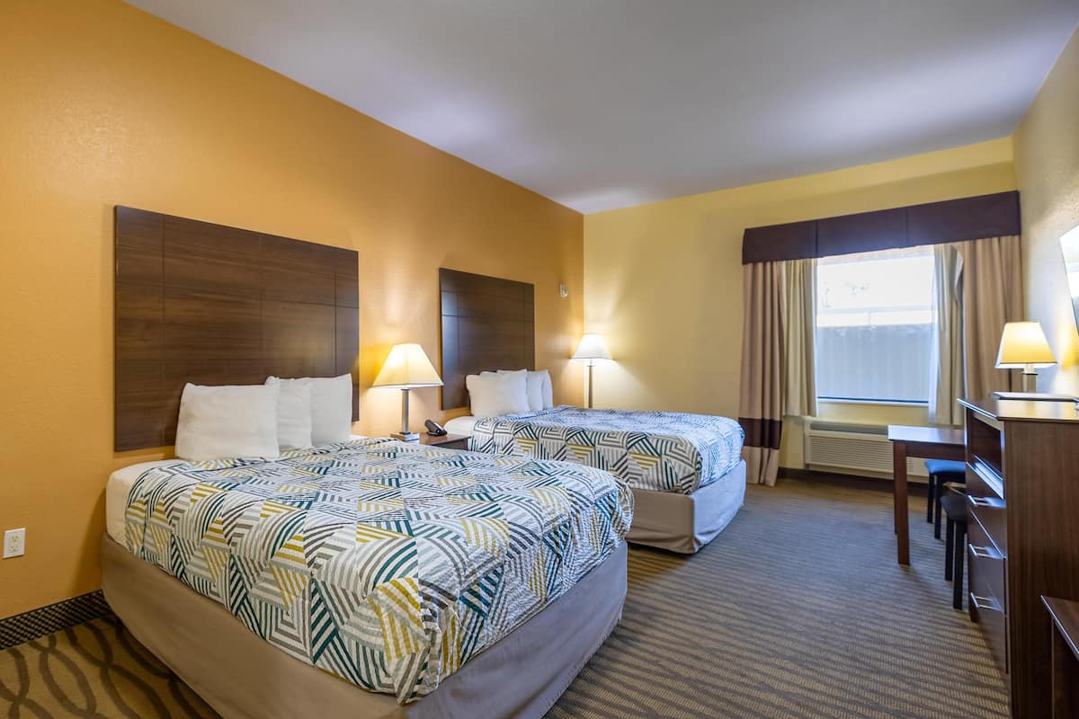 Pillowtop beds, blackout drapes, iron/ironing board, free WiFi