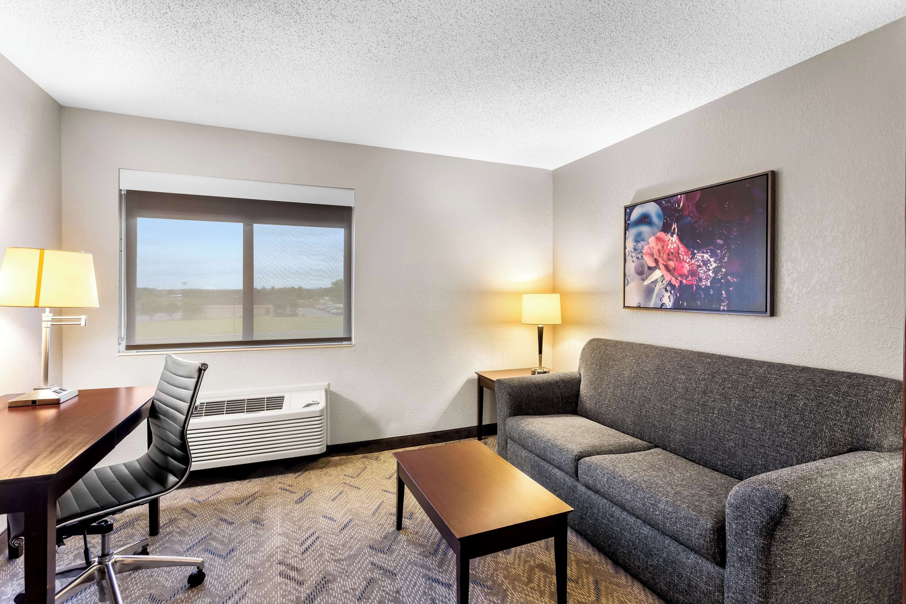 suite, 1 queen bed, accessible, refrigerator & microwave (with sofabed) | 1 bedroom, desk, laptop workspace, iron/ironing board