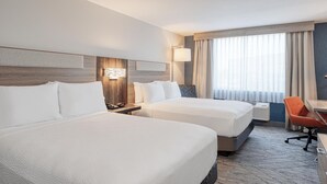 A hotel room with two beds, a desk, a chair, and a window with curtains. - Holiday Inn Express Federal Way Seattle South by IHG (Federal Way)