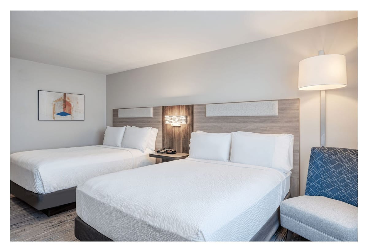 Standard Room, 2 Queen Beds | 1 bedroom, in-room safe, desk, blackout drapes
