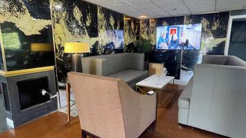 65-inch flat-screen TV with satellite channels