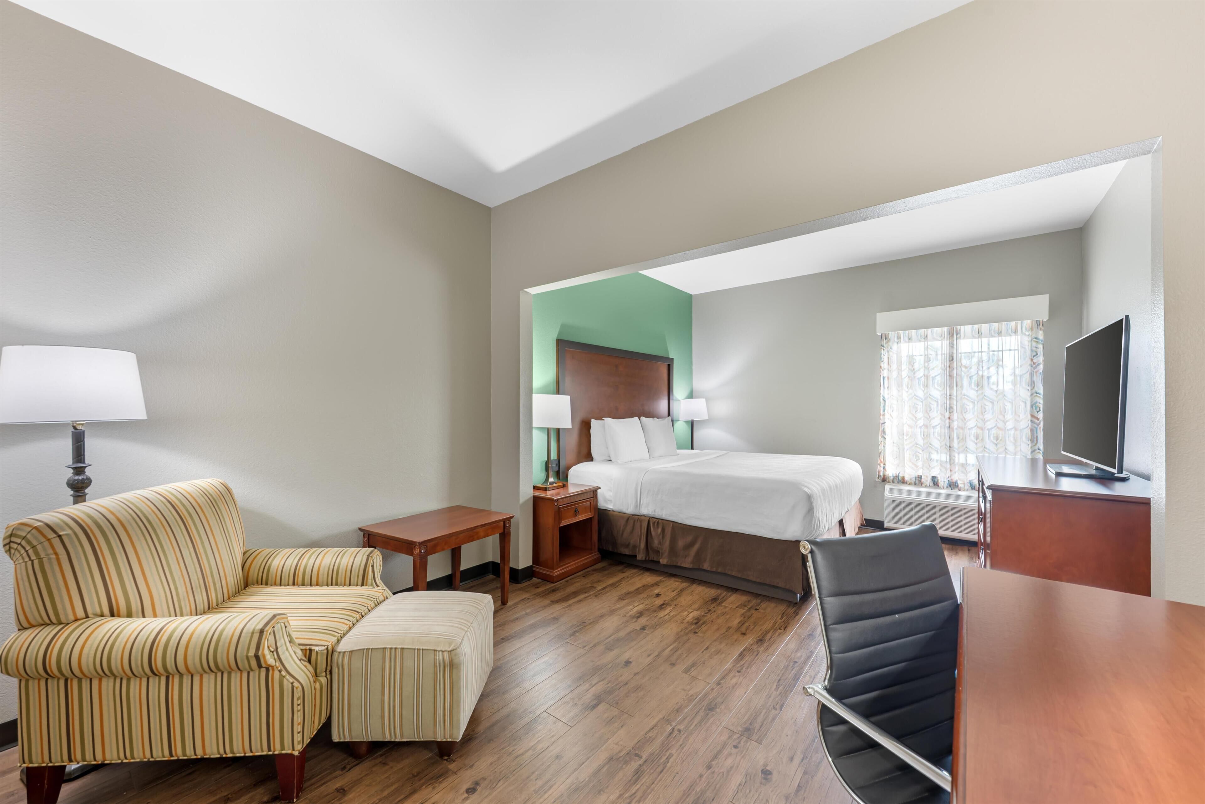 Suite, 1 King Bed, Non Smoking, Refrigerator & Microwave (with Sofabed) | Pillow-top beds, desk, laptop workspace, iron/ironing board