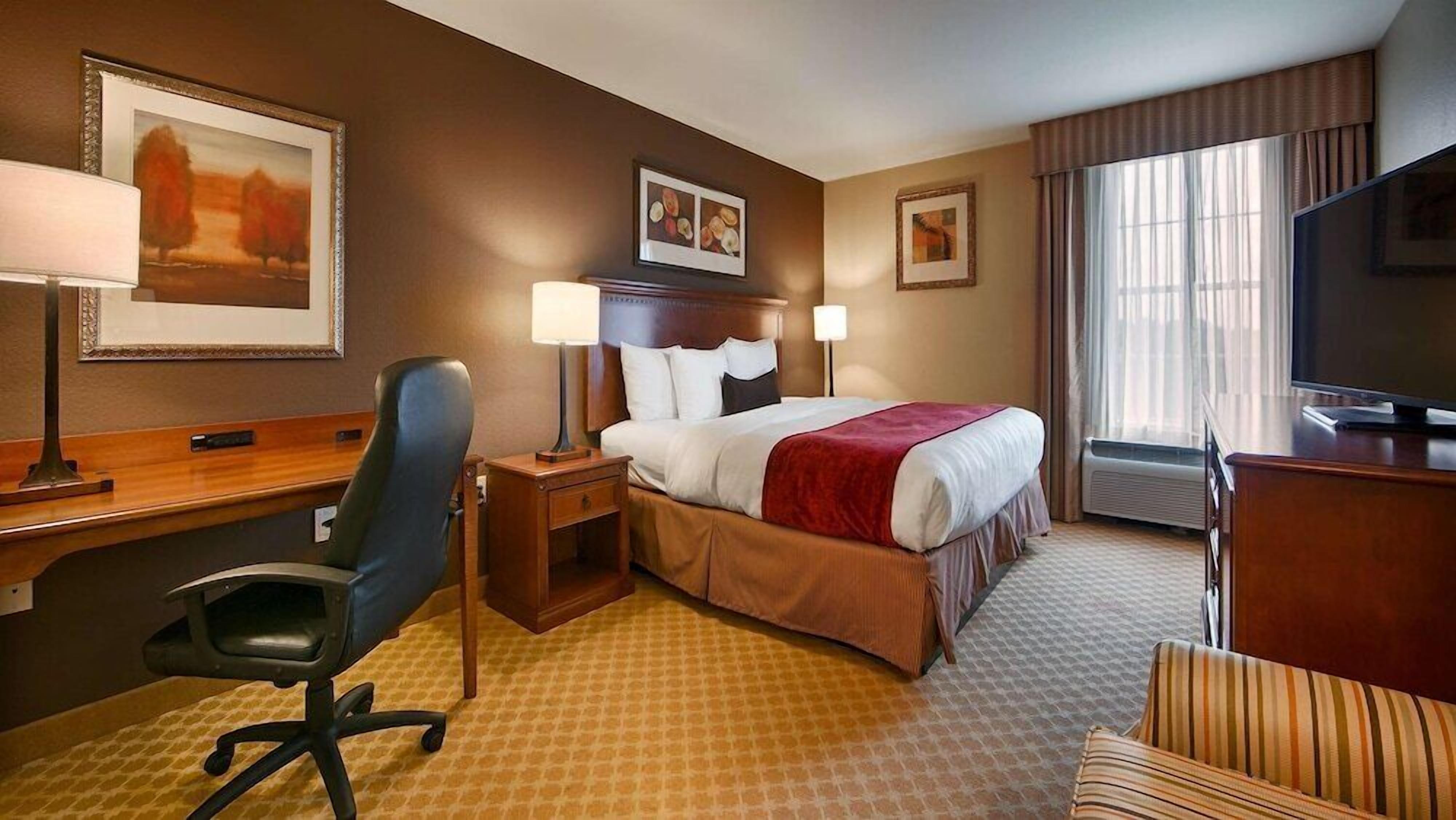 Pillow-top beds, desk, laptop workspace, iron/ironing board
