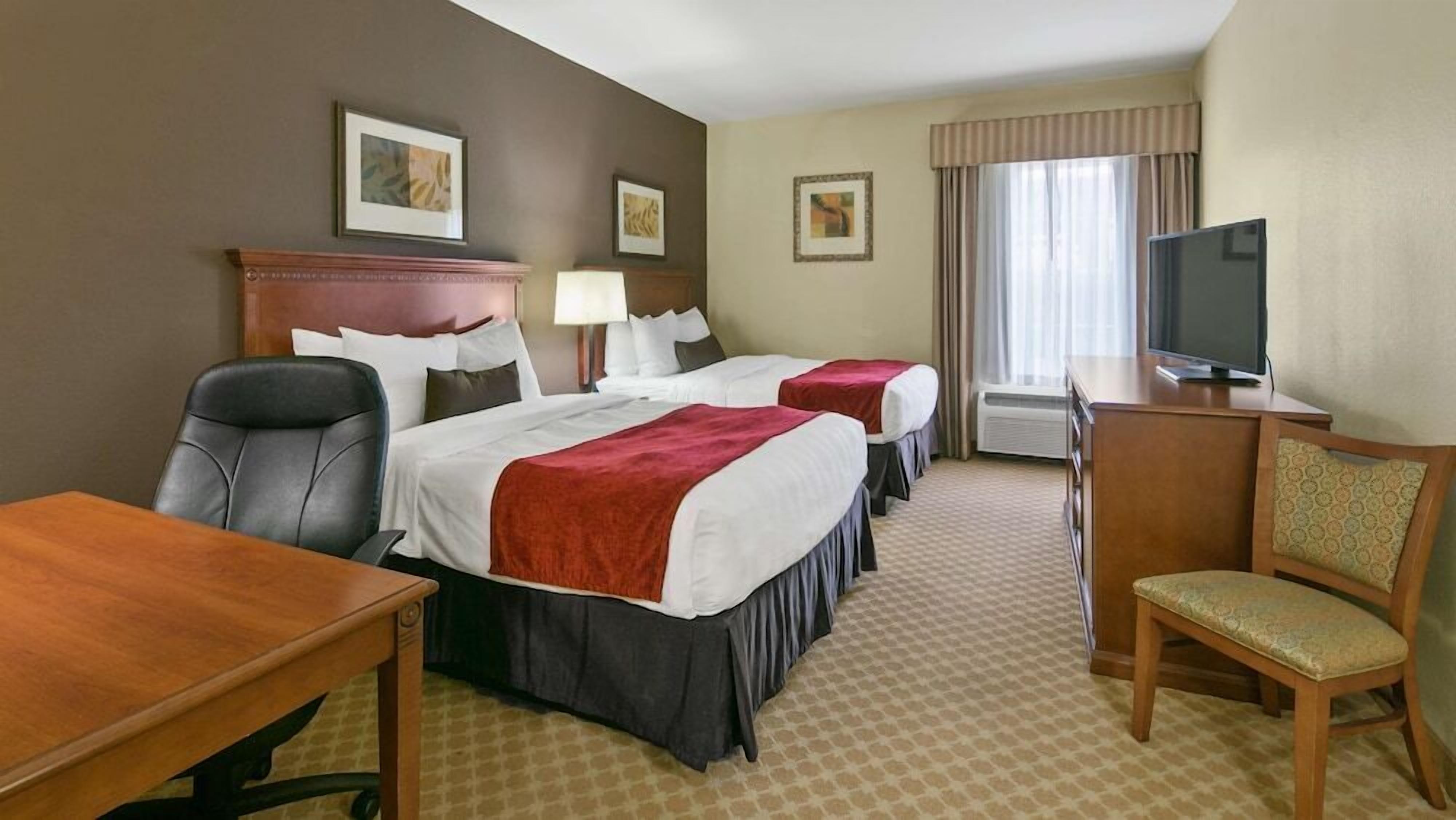 Pillow-top beds, desk, laptop workspace, iron/ironing board