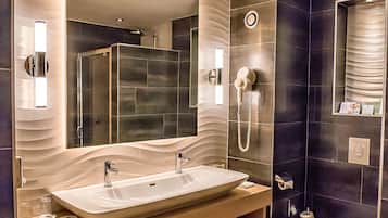 Suite, 1 King Bed with Sofa bed | Bathroom | Free toiletries, hair dryer, towels