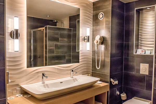 Suite, 1 King Bed with Sofa bed | Bathroom | Free toiletries, hair dryer, towels