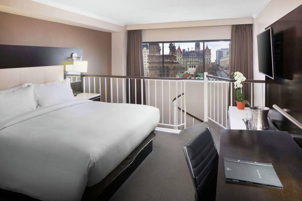 Premium bedding, down duvets, pillow-top beds, in-room safe