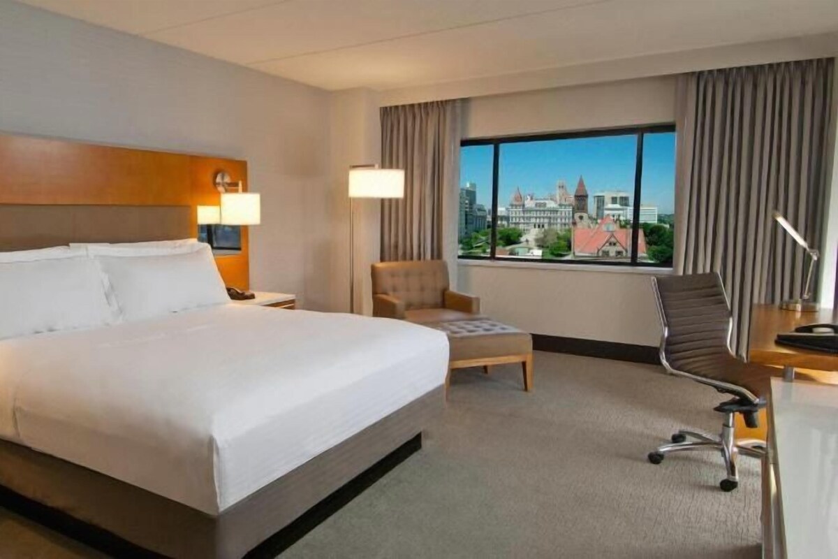 Premium bedding, down comforters, pillowtop beds, in-room safe