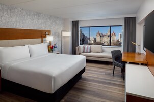 Premium bedding, down comforters, pillowtop beds, in-room safe