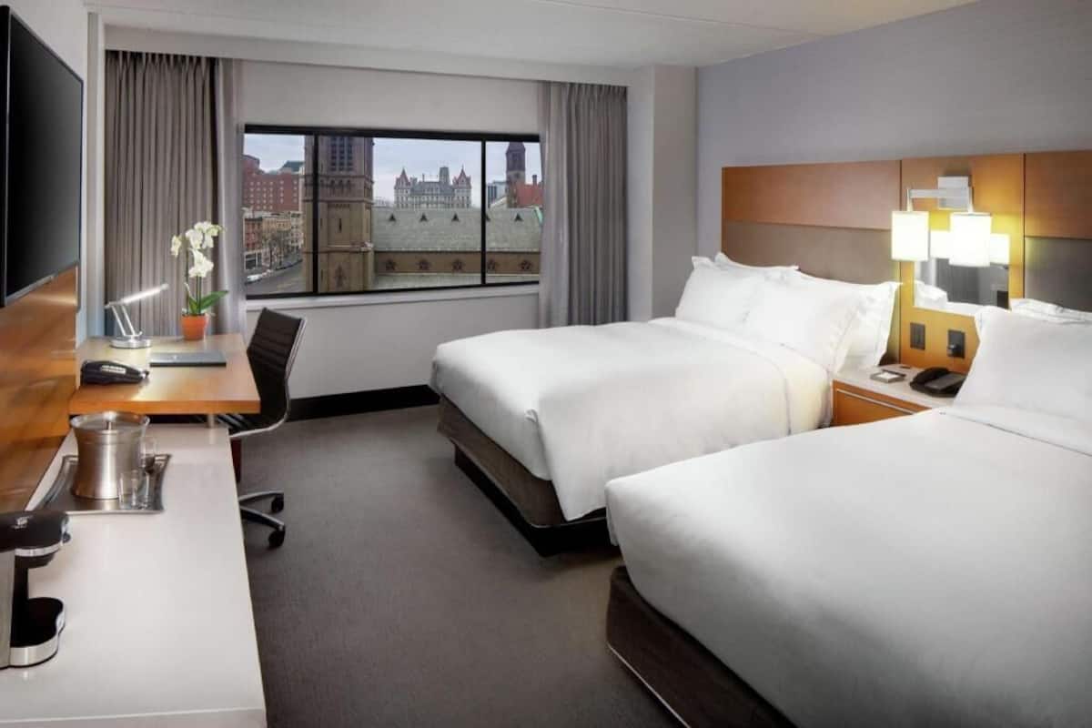Premium bedding, down comforters, pillowtop beds, in-room safe