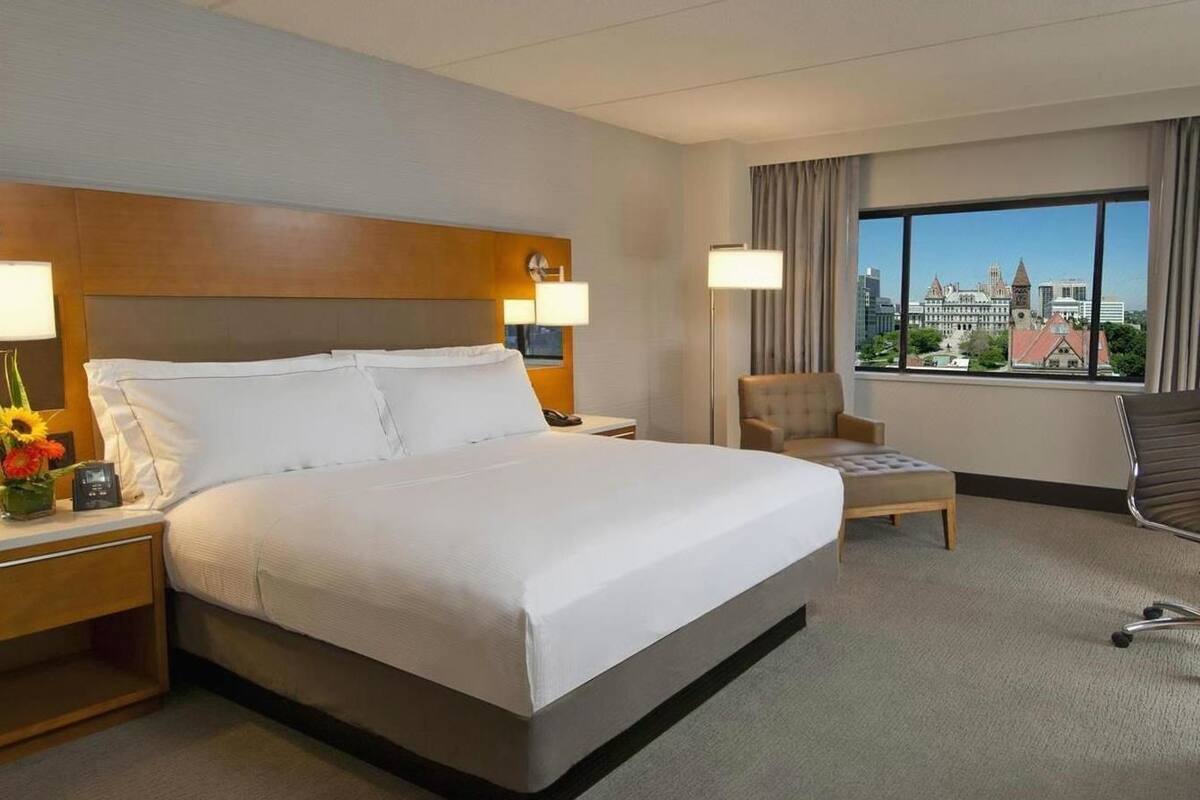 Premium bedding, down duvets, pillow-top beds, in-room safe