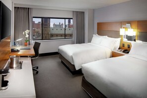 Premium bedding, down comforters, pillowtop beds, in-room safe