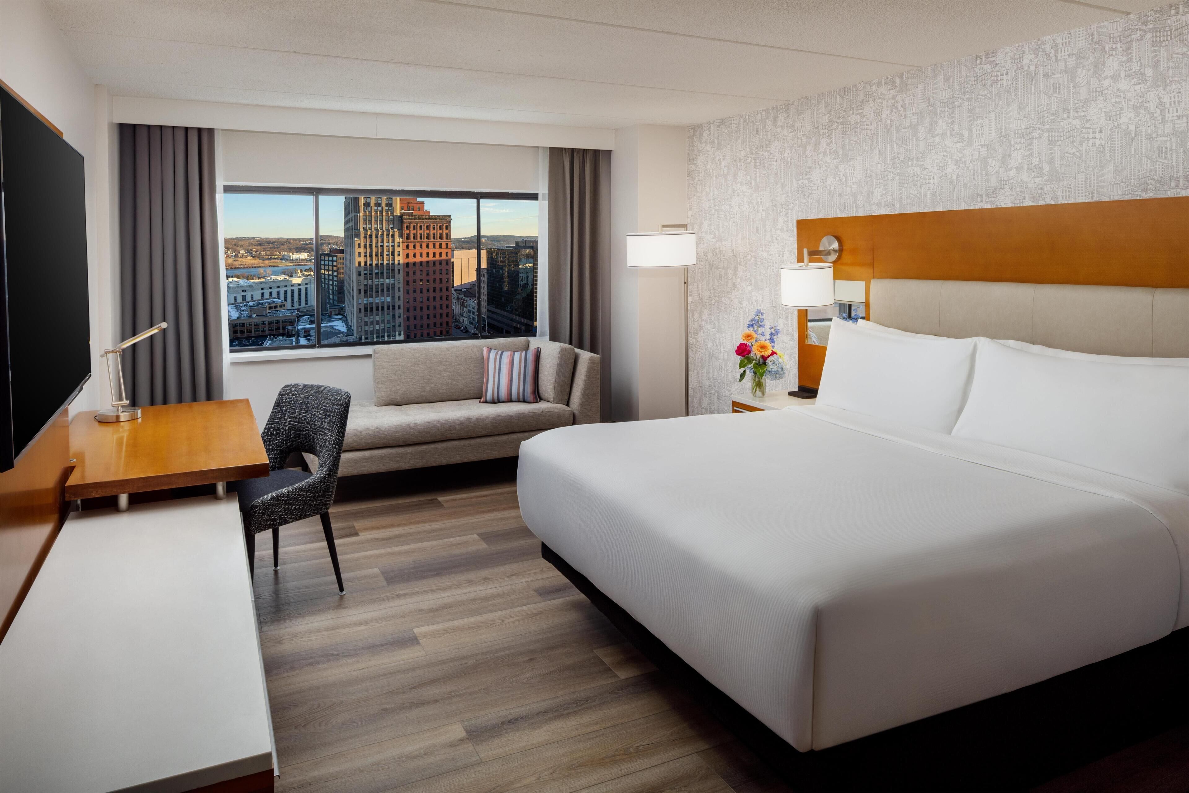 Premium bedding, down duvets, pillow-top beds, in-room safe