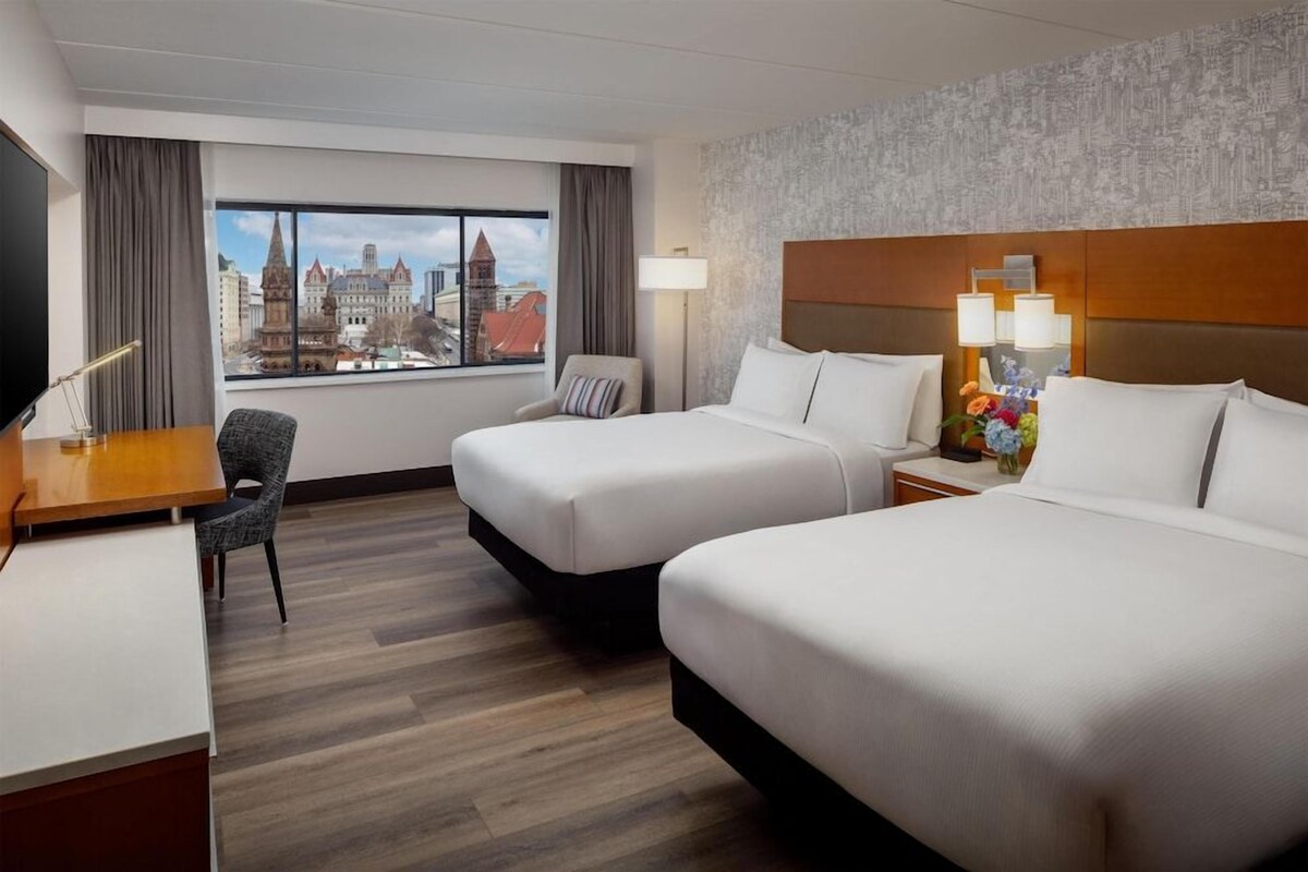 Premium bedding, down comforters, pillowtop beds, in-room safe