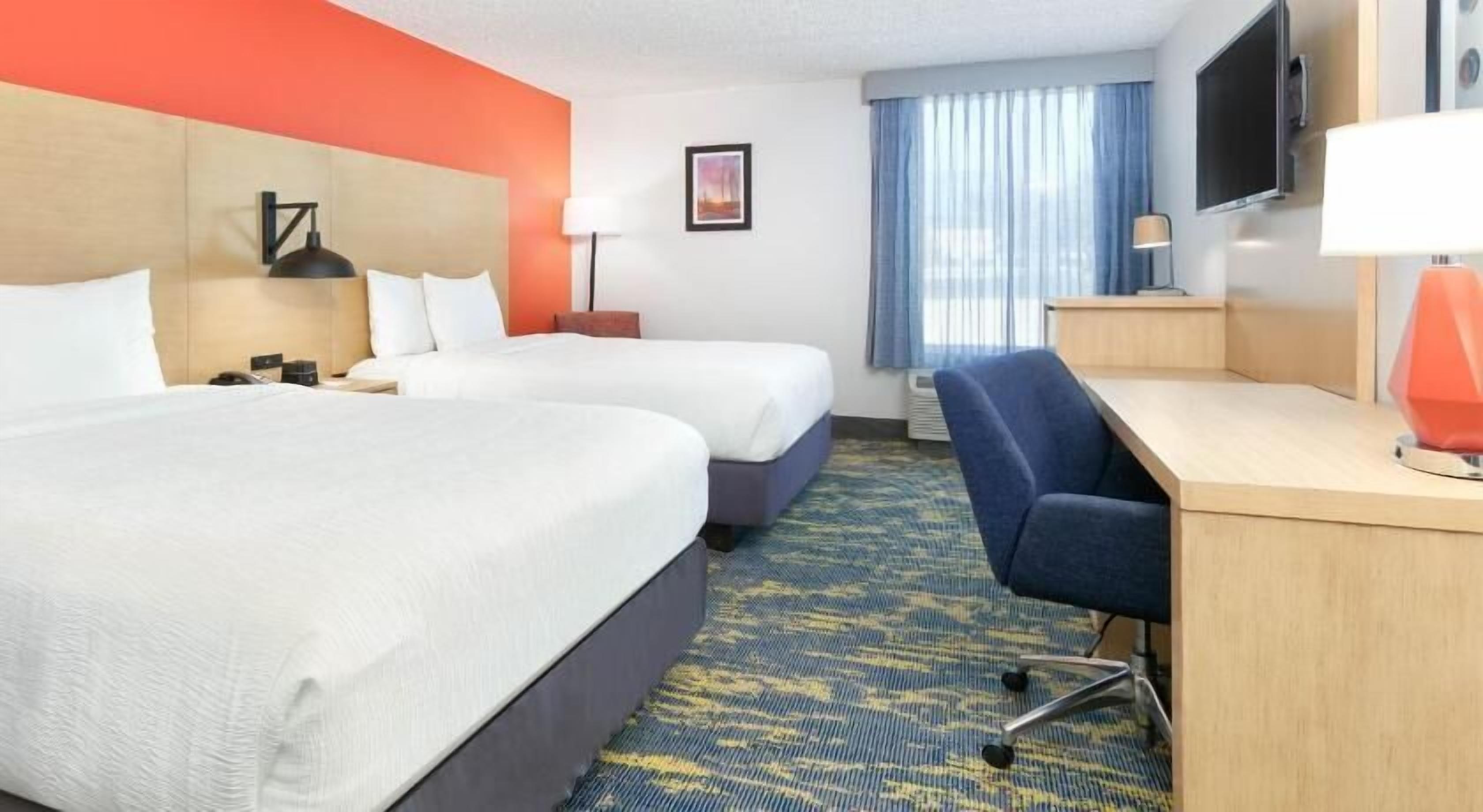 Premium bedding, down comforters, desk, laptop workspace