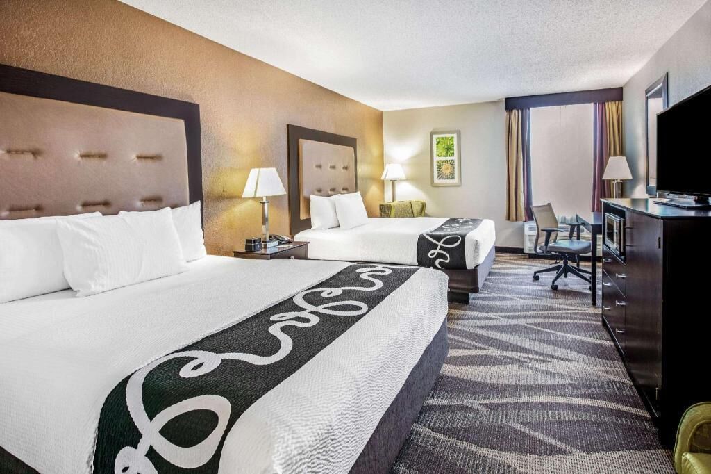 Premium bedding, down comforters, desk, laptop workspace