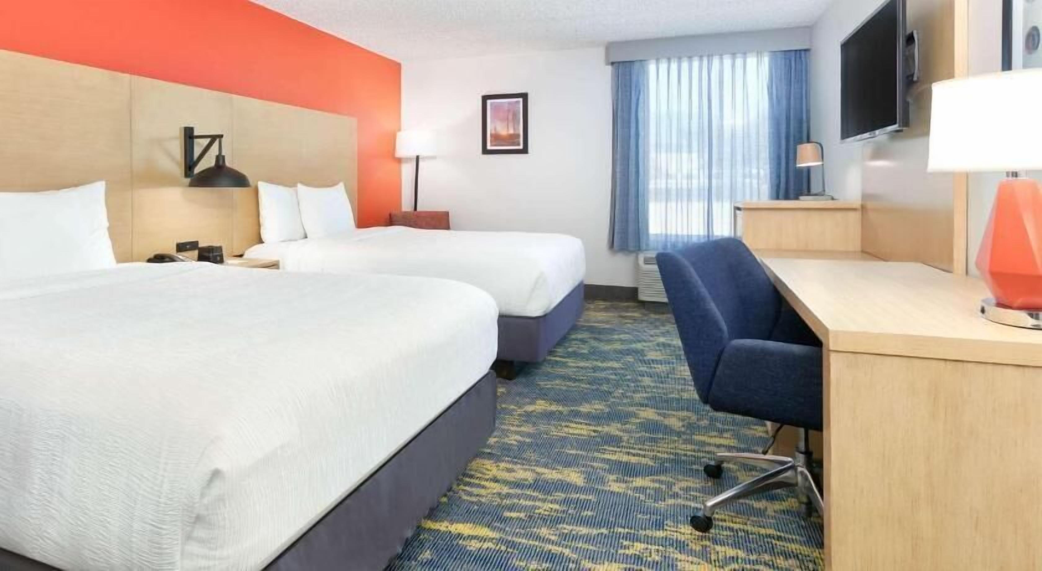 Premium bedding, down comforters, desk, laptop workspace