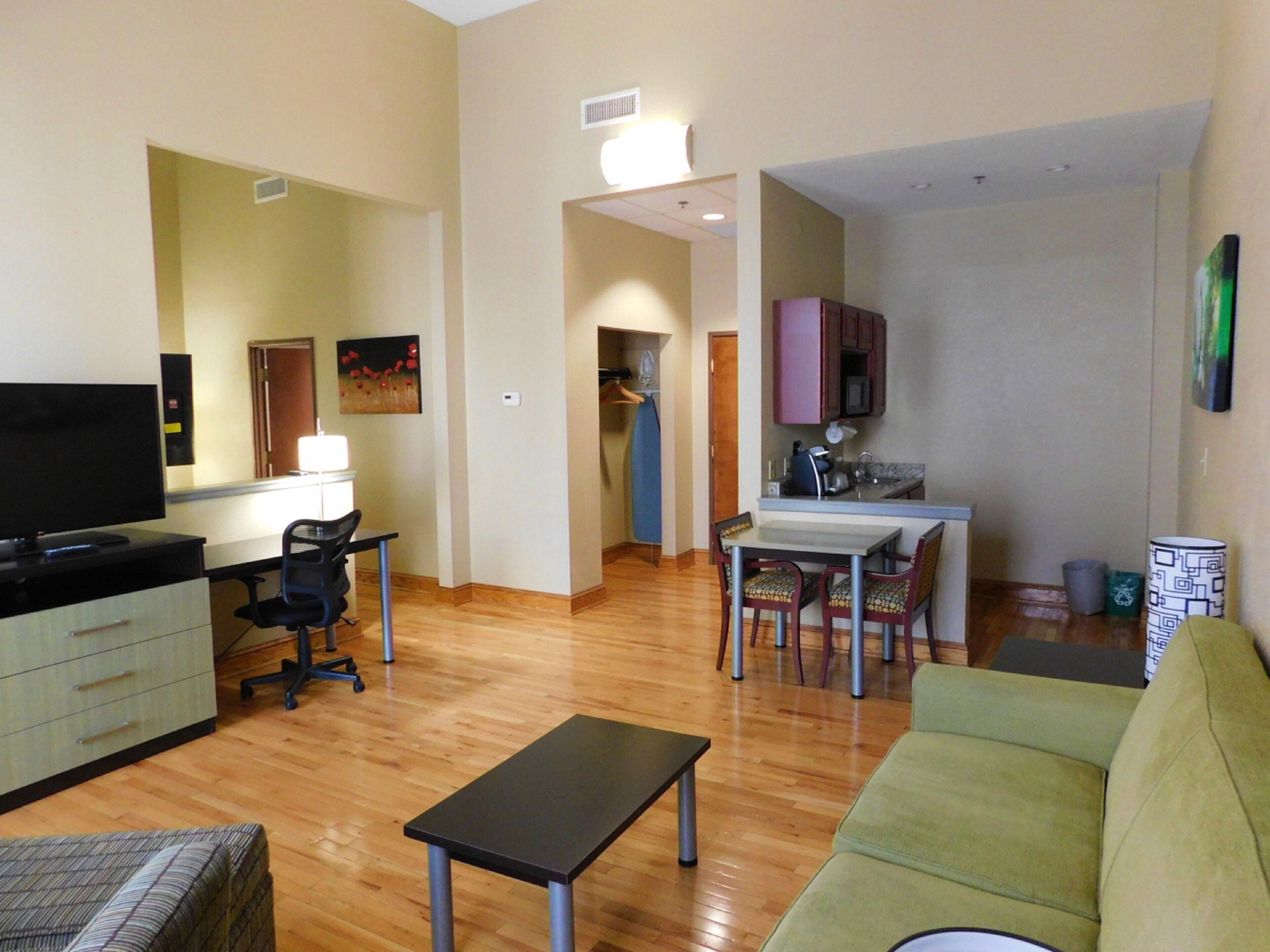 Standard Room, Multiple Beds | Living area | 48-inch flat-screen TV with cable channels, TV