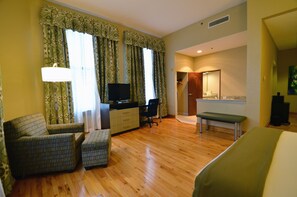 Premium bedding, down comforters, blackout drapes, iron/ironing board