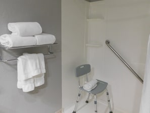 Suite, 1 King Bed with Sofa bed, Accessible (Roll-In Shower) | Bathroom amenities | Hair dryer, towels