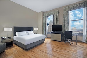 Premium bedding, down comforters, blackout drapes, iron/ironing board