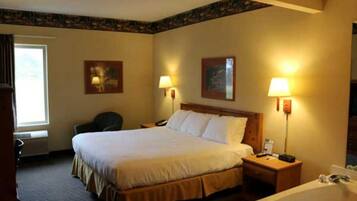 Room, 1 King Bed, Jetted Tub | Desk, free WiFi, bed sheets