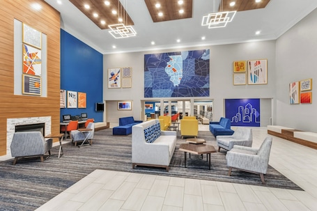 Lobby sitting area. Holiday Inn Express & Suites Bloomington - Normal by IHG