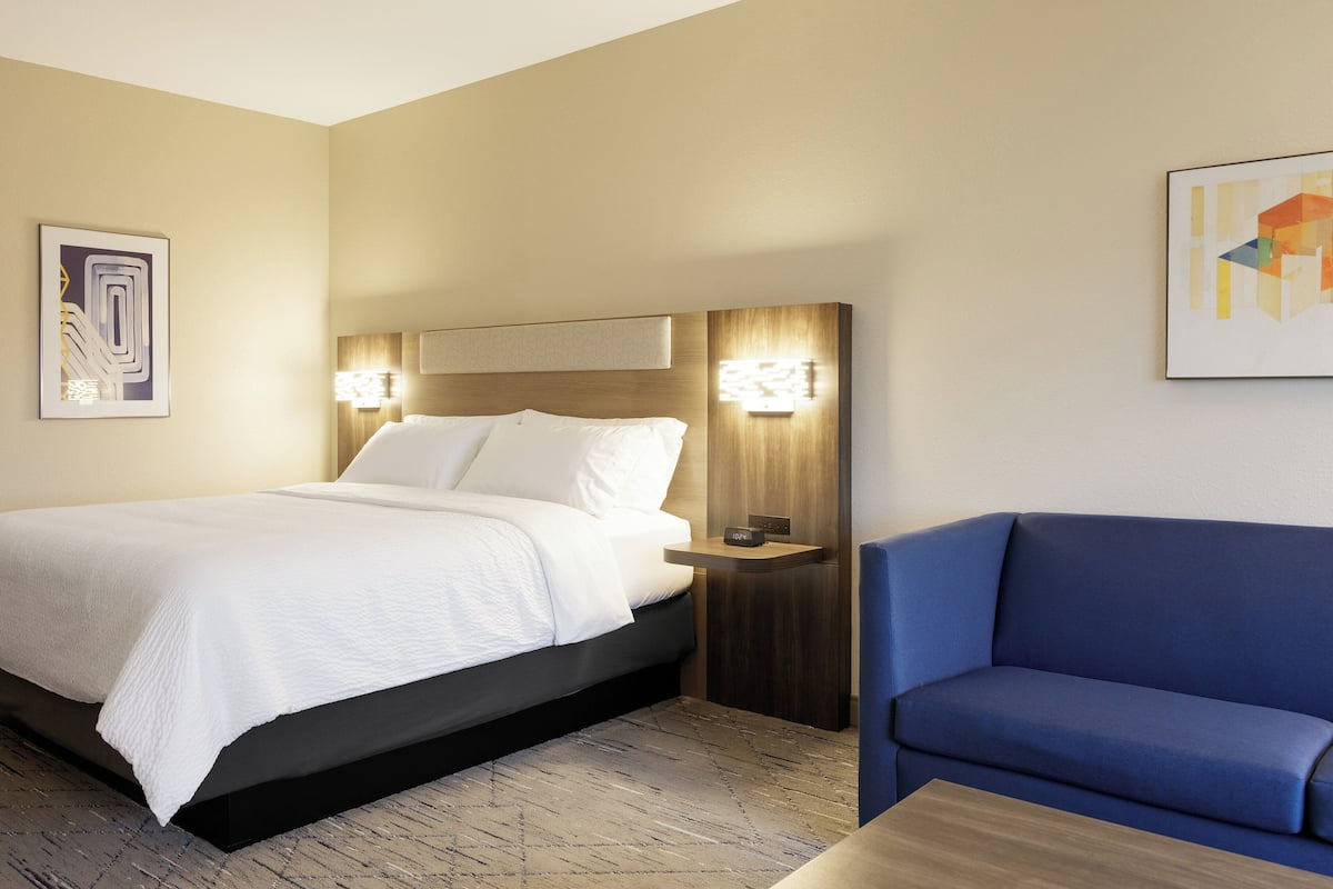 Premium bedding, desk, laptop workspace, blackout curtains