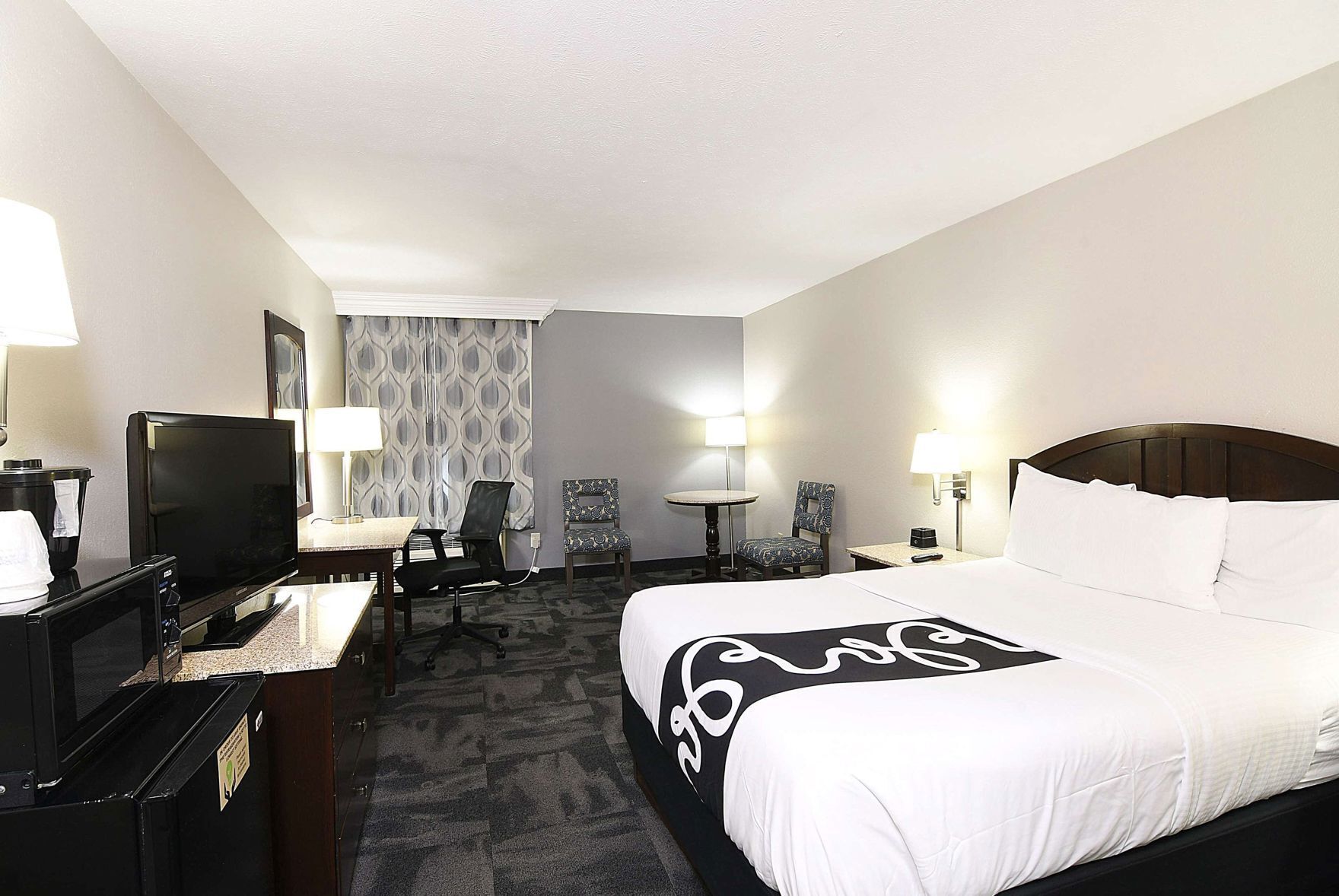 Premium bedding, down comforters, pillowtop beds, in-room safe