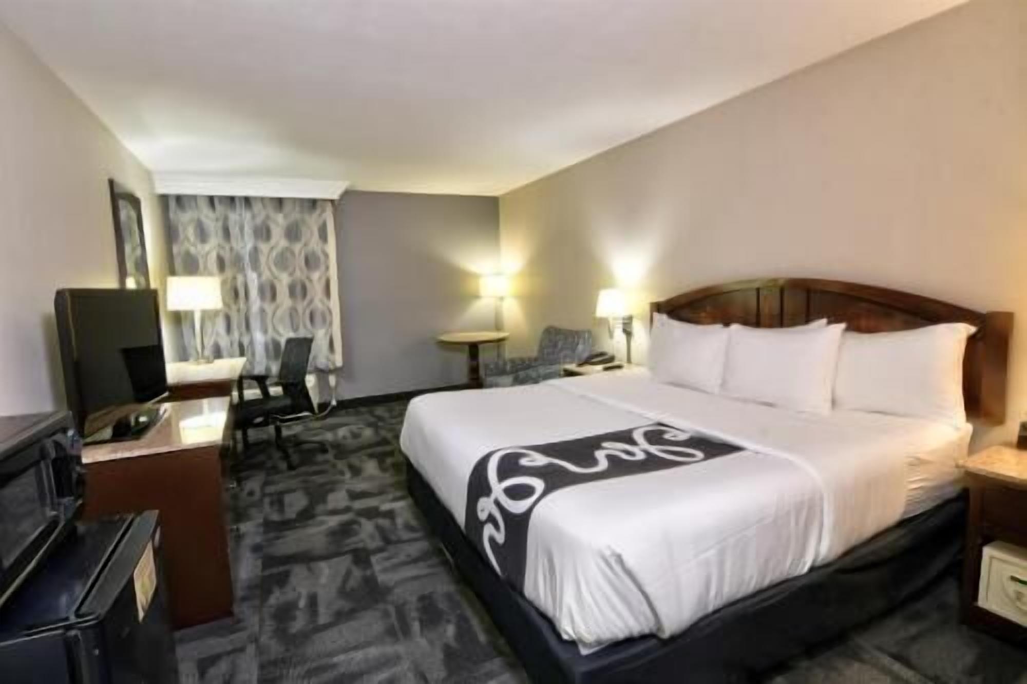 Premium bedding, down comforters, pillowtop beds, in-room safe