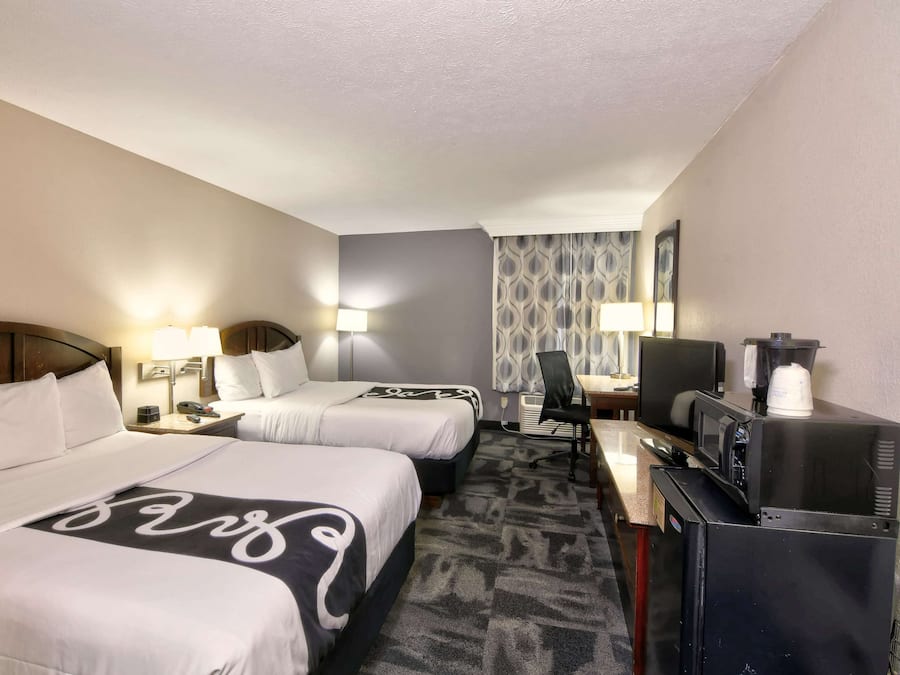 Premium bedding, down duvets, pillow-top beds, in-room safe