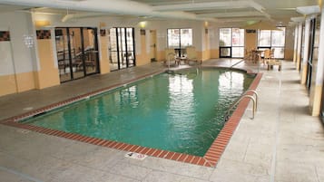 Indoor pool, open 9:00 AM to 10:00 PM, pool loungers