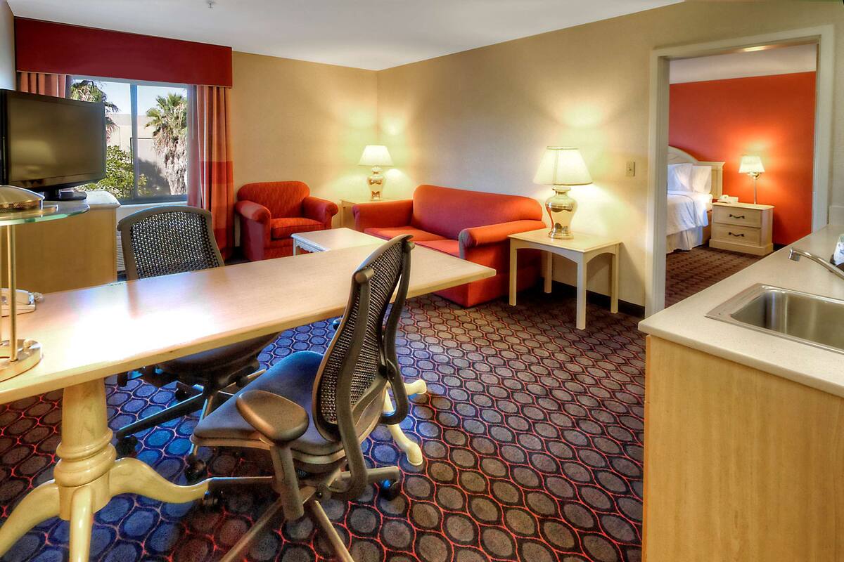 Suite, 1 King Bed, Non Smoking | In-room safe, iron/ironing board, free cots/infant beds