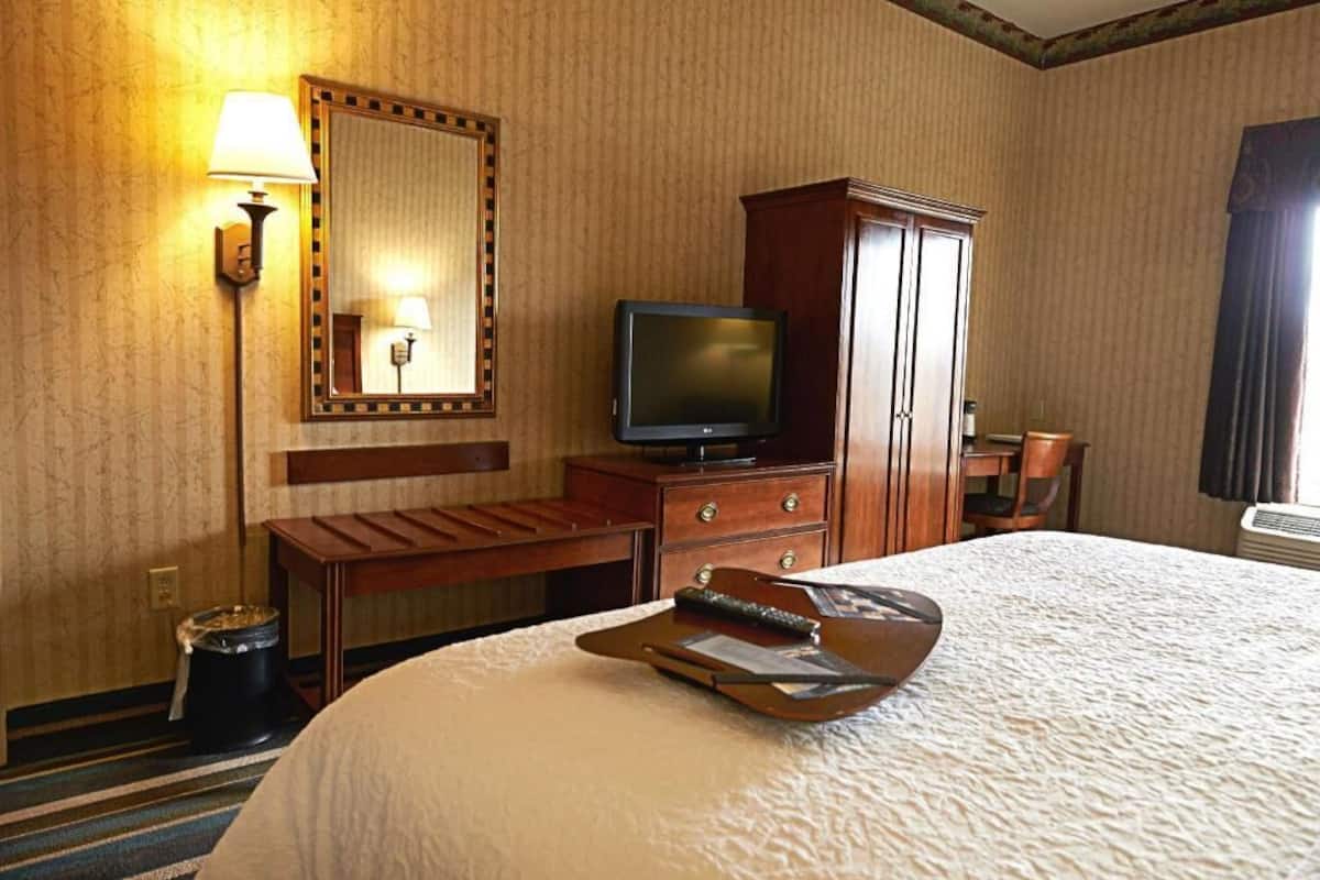 Premium bedding, pillow-top beds, desk, laptop workspace