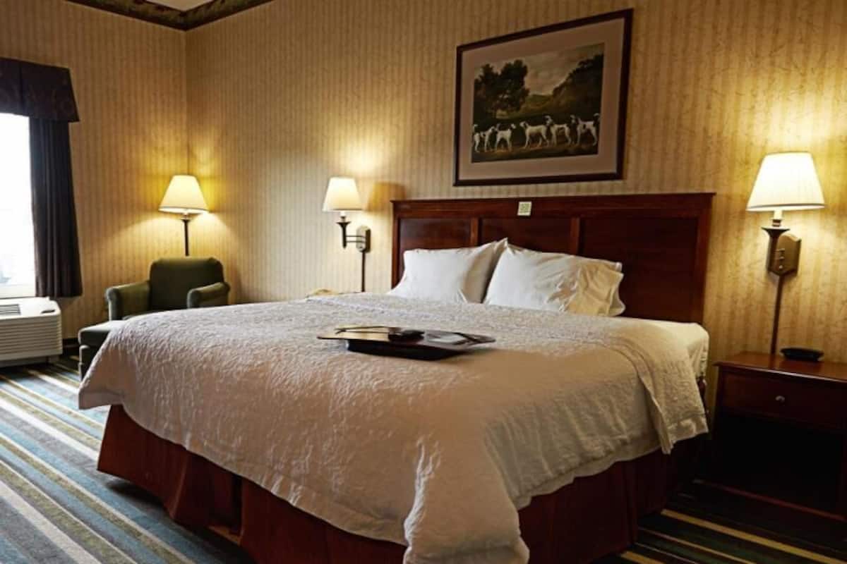 Premium bedding, pillow-top beds, desk, laptop workspace