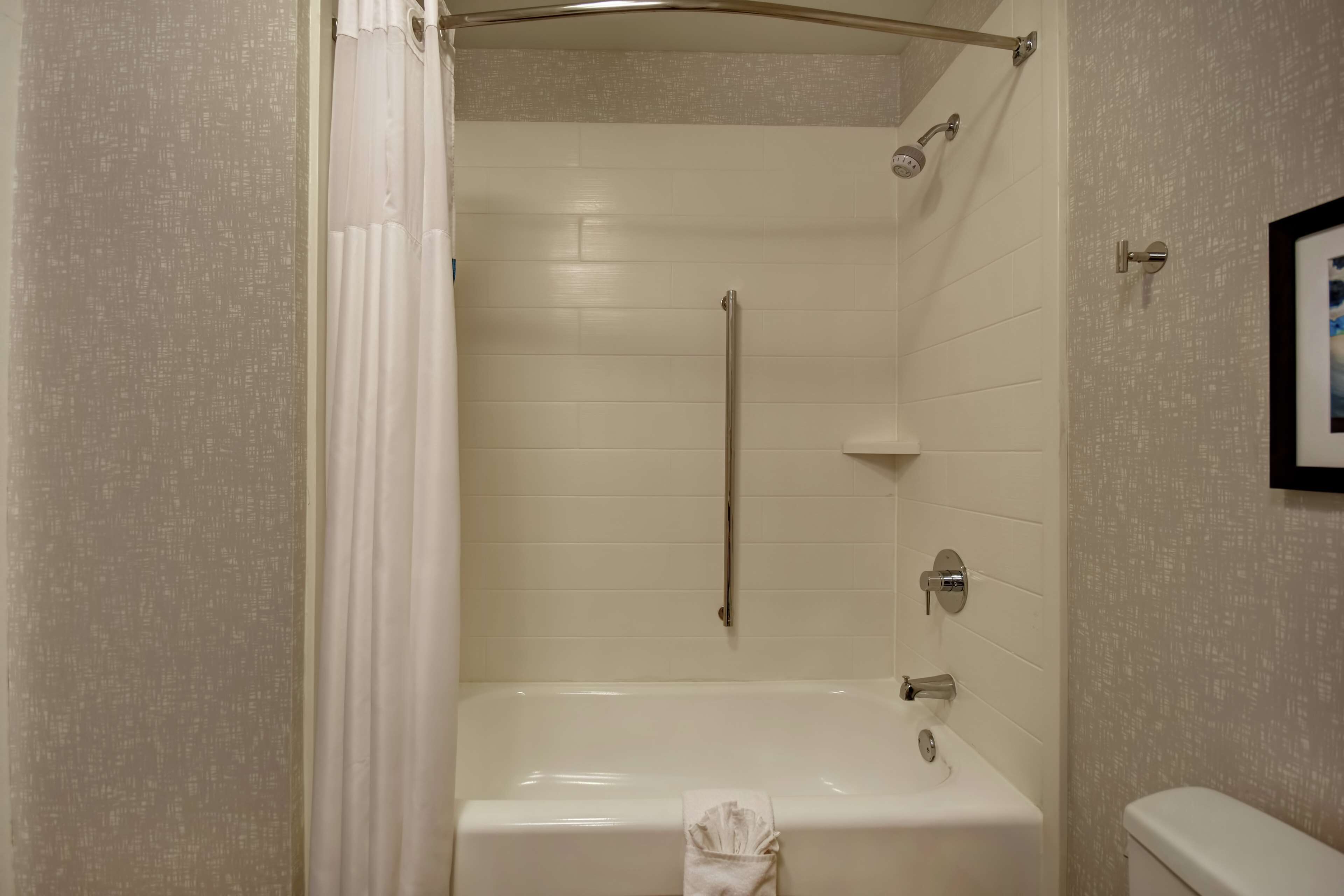 combined shower/bathtub, free toiletries, hair dryer, towels