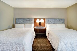 Premium bedding, down comforters, pillowtop beds, in-room safe