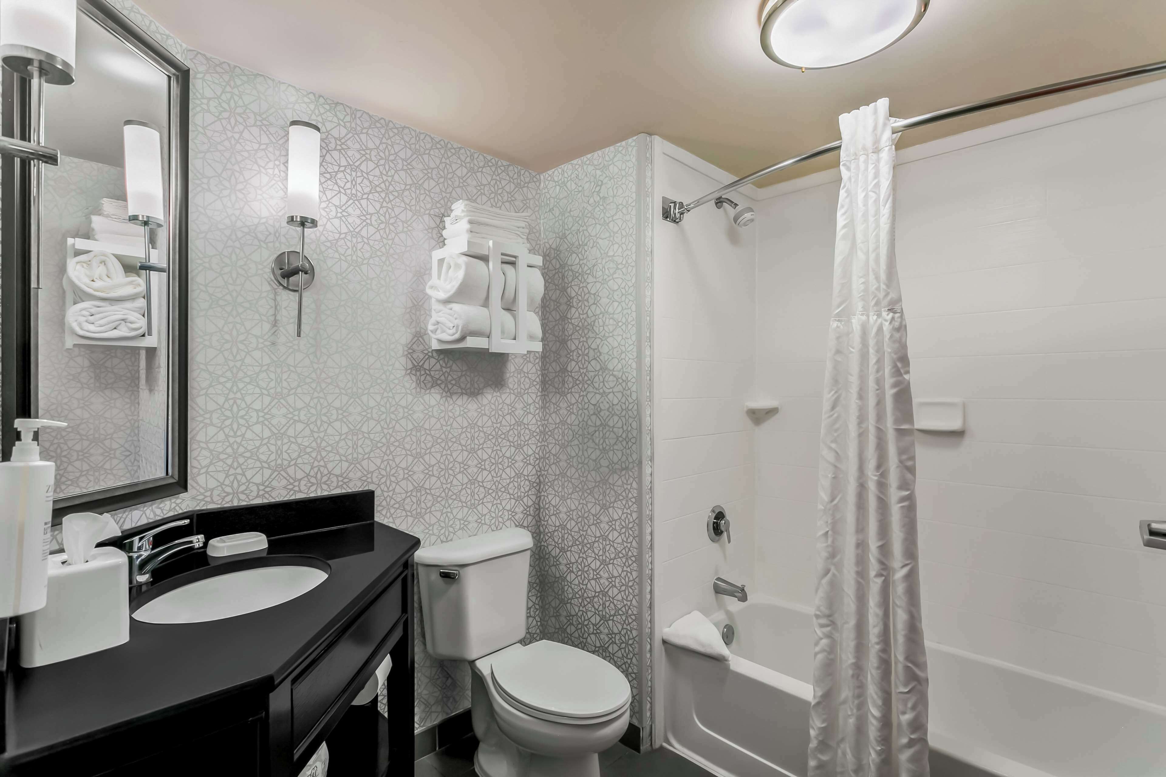 room, 2 queen beds | bathroom | free toiletries, hair dryer, bathrobes, towels