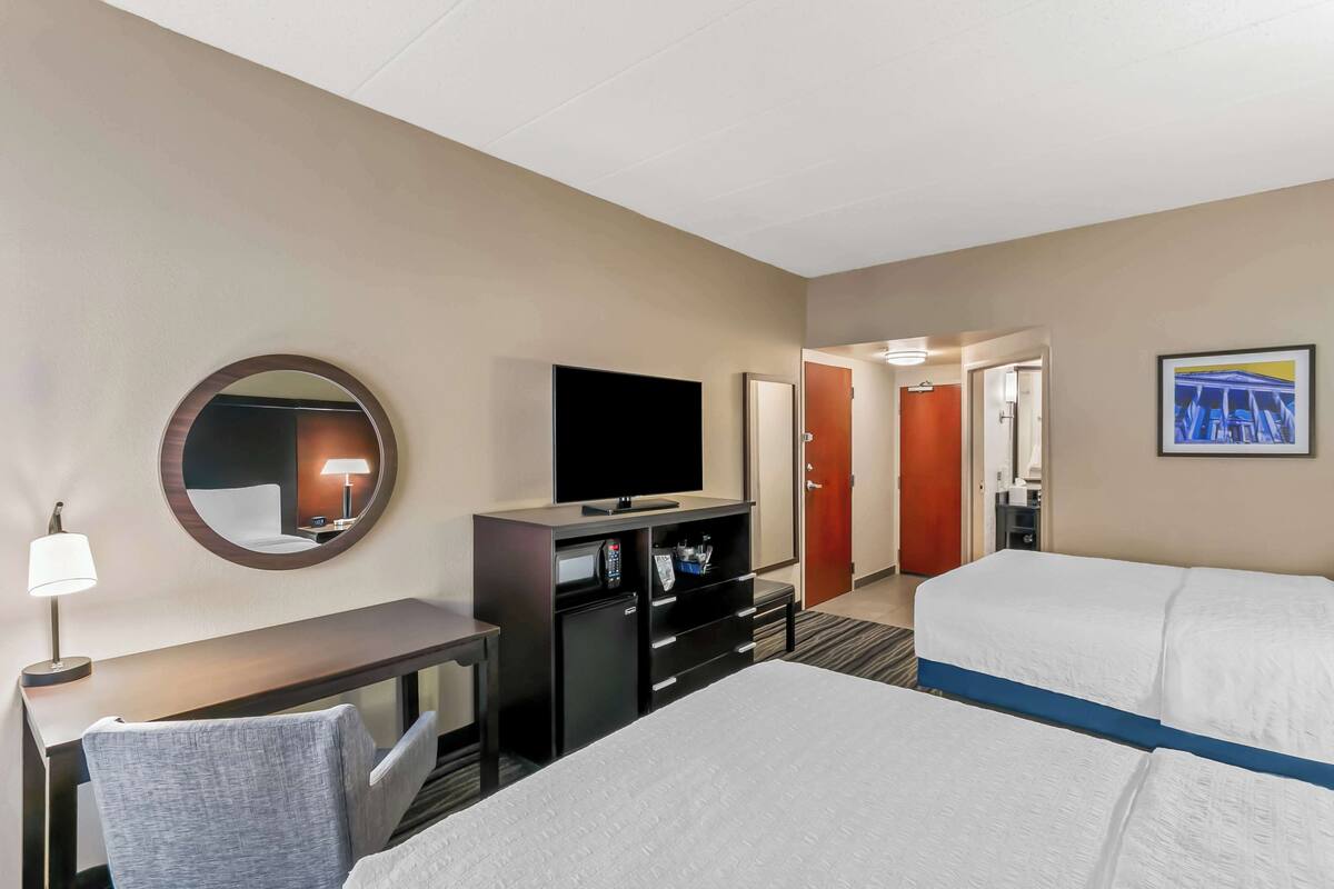 Room, 2 Queen Beds | Desk, laptop workspace, blackout curtains, iron/ironing board