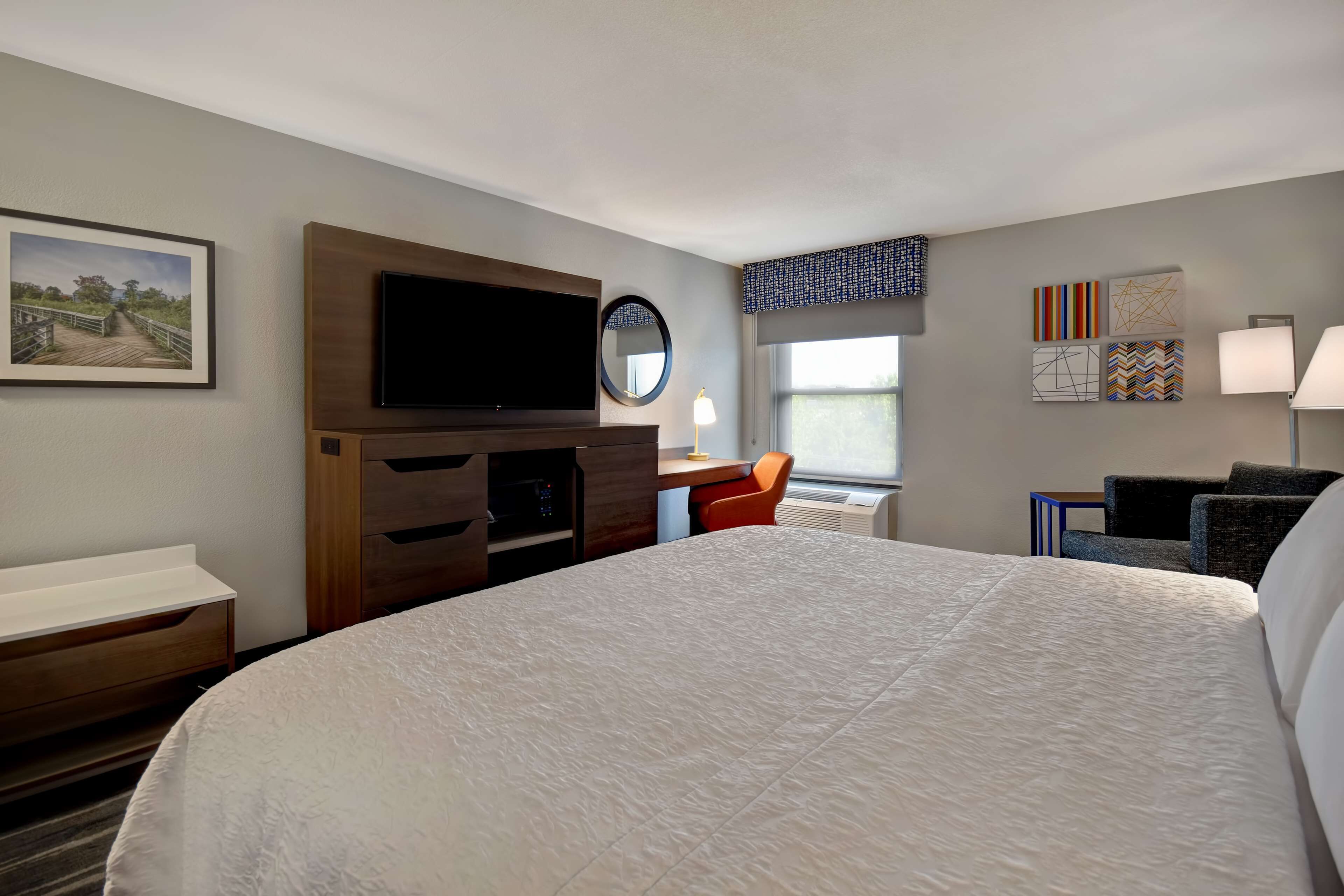 premium bedding, desk, laptop workspace, blackout curtains